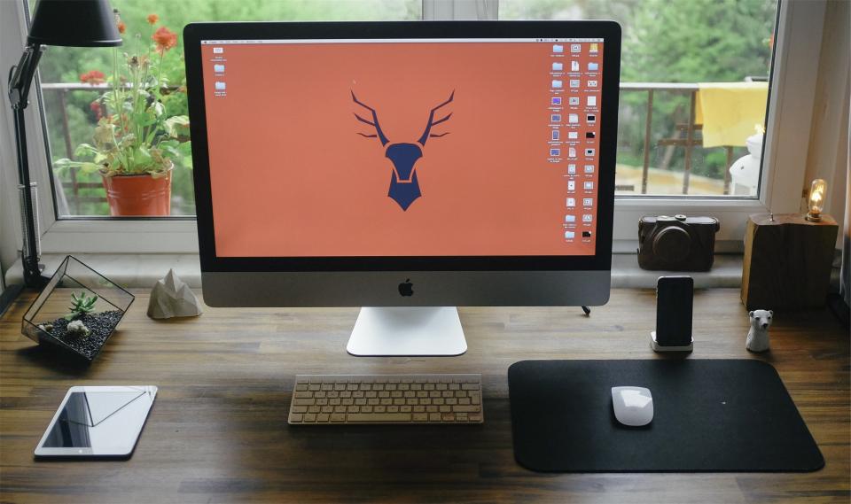 apple mac computer desktop mouse keyboard tablet ipad iphone mobile desk office wood lamp camera slr window monitor screen work technology peripherals business
