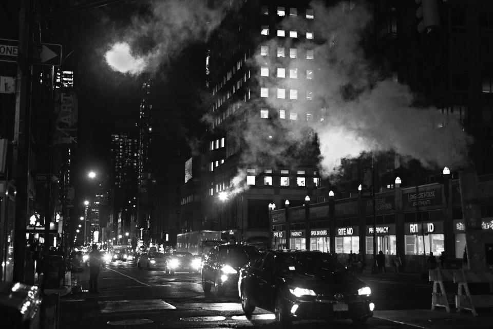 architecture building infrastructure car vehicle transportation street road city urban black and white night lights smoke fire