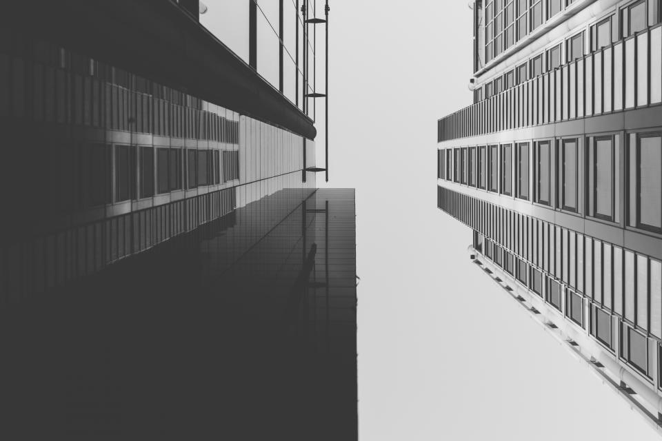 building skyscraper high rise architecture urban black and white sky