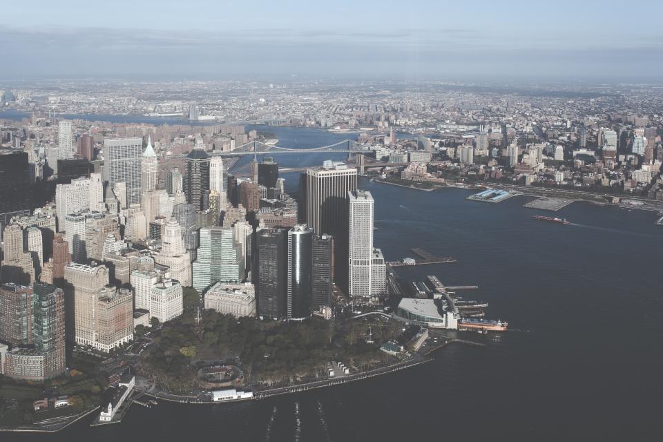 architecture building infrastructure city landmark trees plant sky boat water sea ocean water tower skyscraper skyline