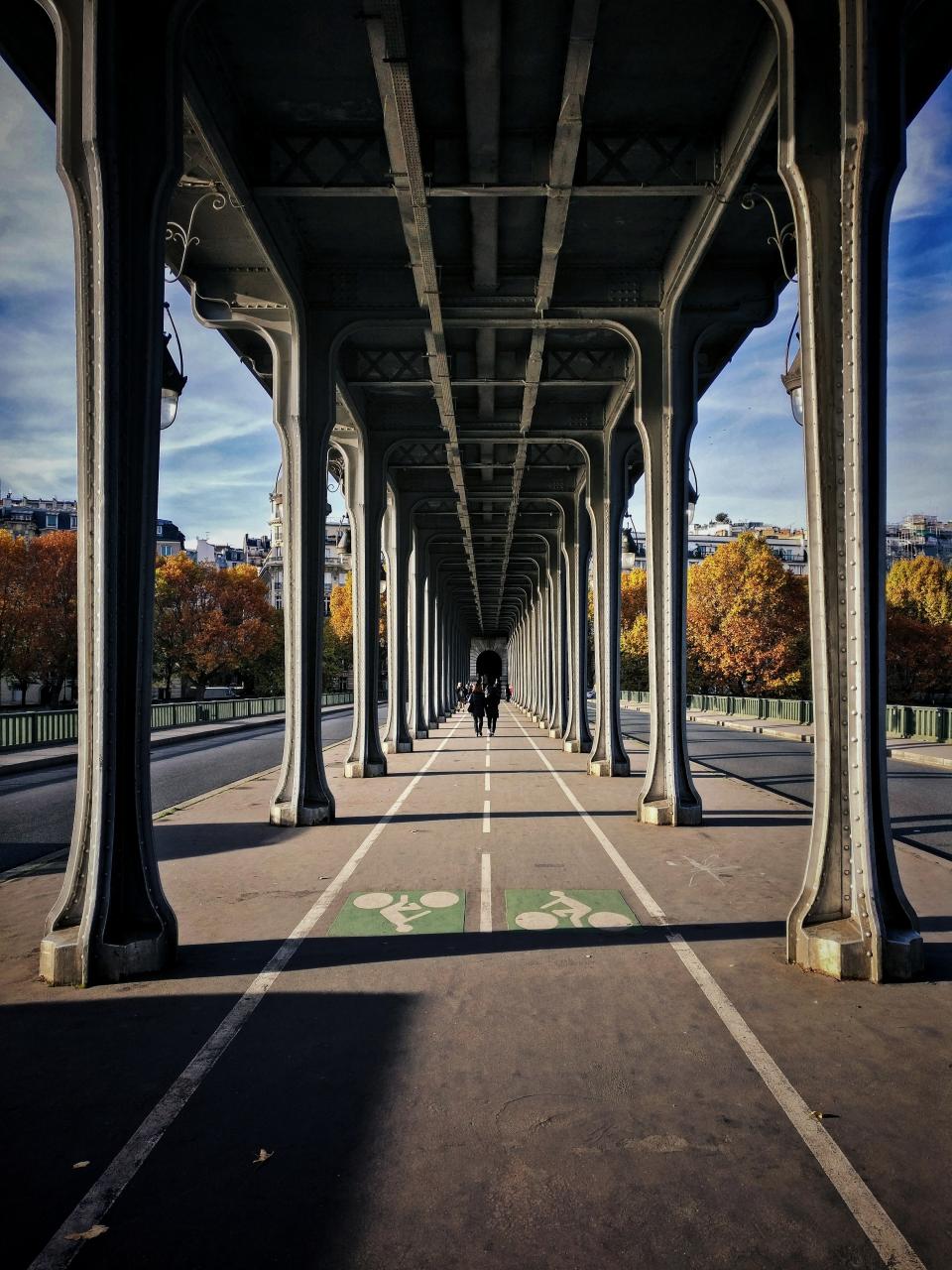 bridge urban city people couple happy walking architecture infrastructure structure trees autumn fall building