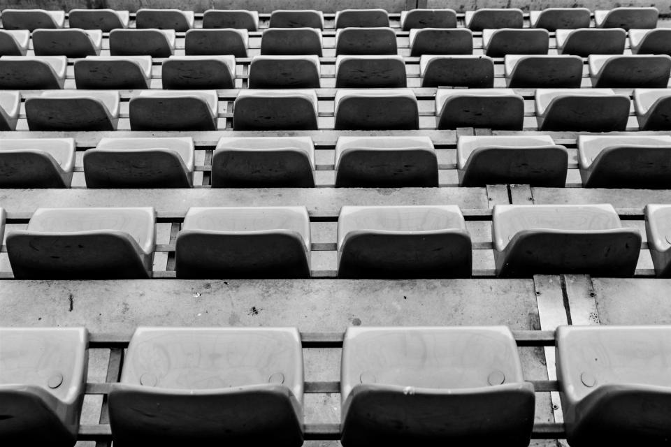 seats chairs stadium rows event black and white