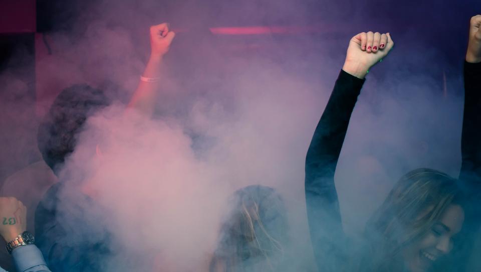 people party celebration crowd dark night stage lights concert performance smoke