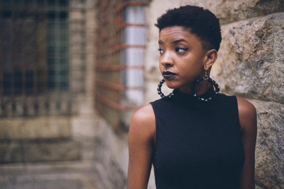 people woman earrings fashion lipstick house blur black african american
