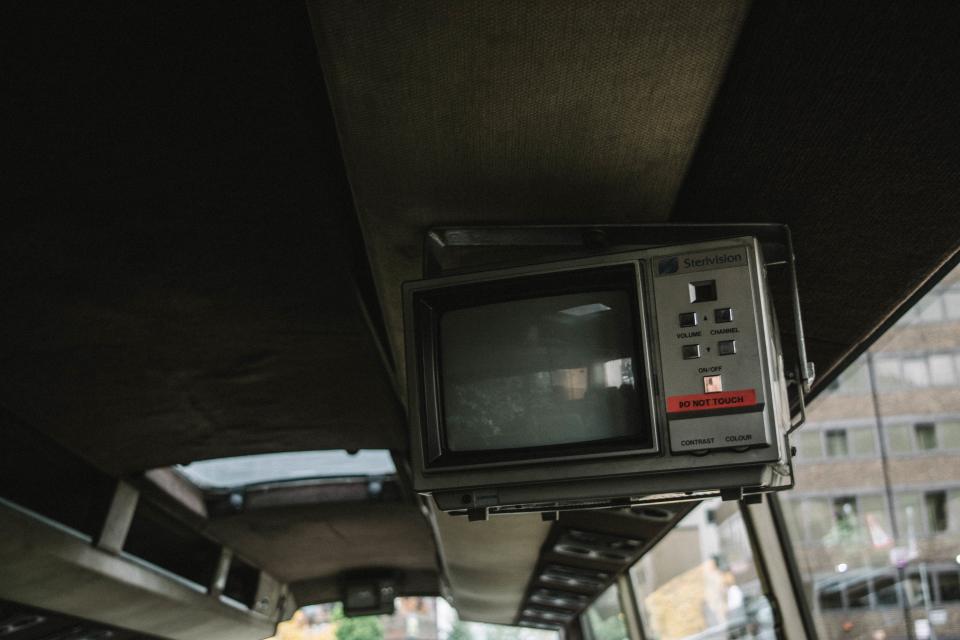 bus tv vintage ceiling transportation electronic glass city building blur
