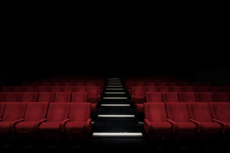 auditorium stadium bench chairs inside seats theater dark