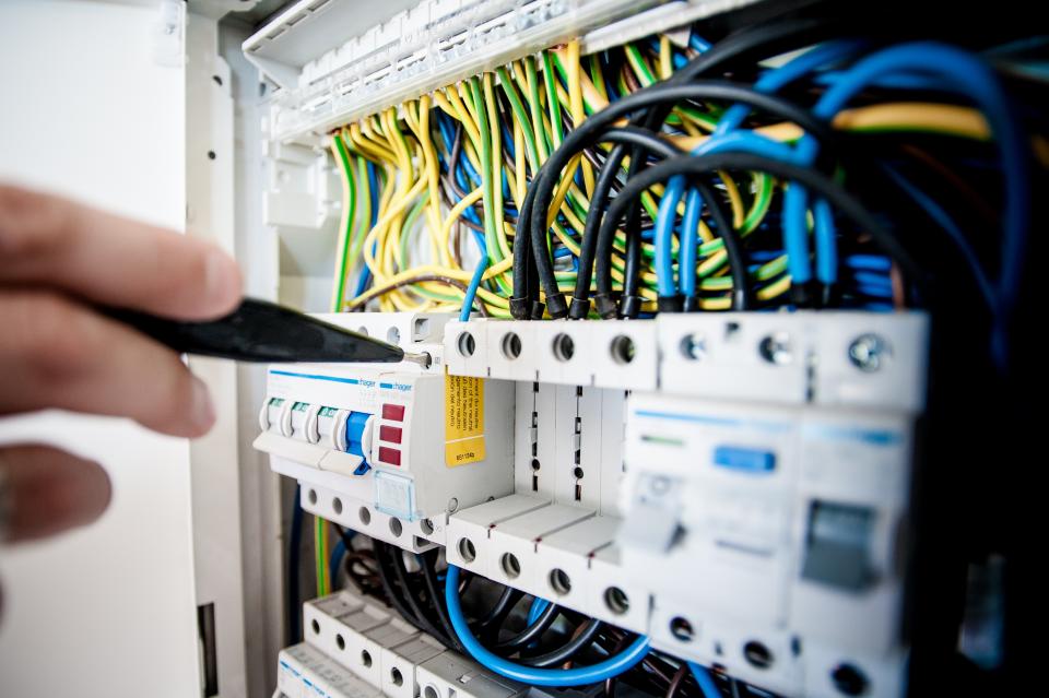 electricity switches box repairs construction renovations building safety work hands