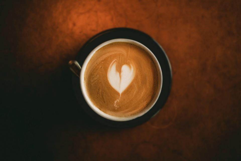 coffee latte art froth cappuccino drink espresso milk foam mug caffeine dark cup saucer table kitchenware