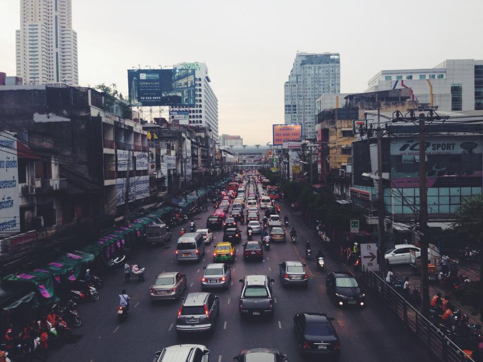 cars, scooters, bikes, mopeds, traffic, busy, city, thailand, asia, buildings, stores, shops, road, street, signs, billboards