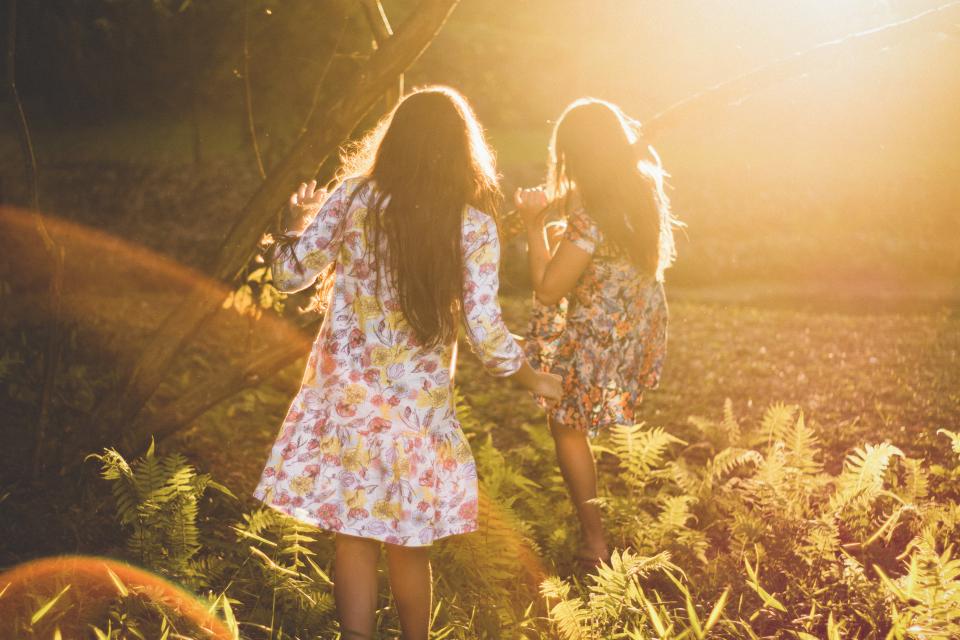 people woman parent sun dress summer autumn fall leaves green happy grass play 