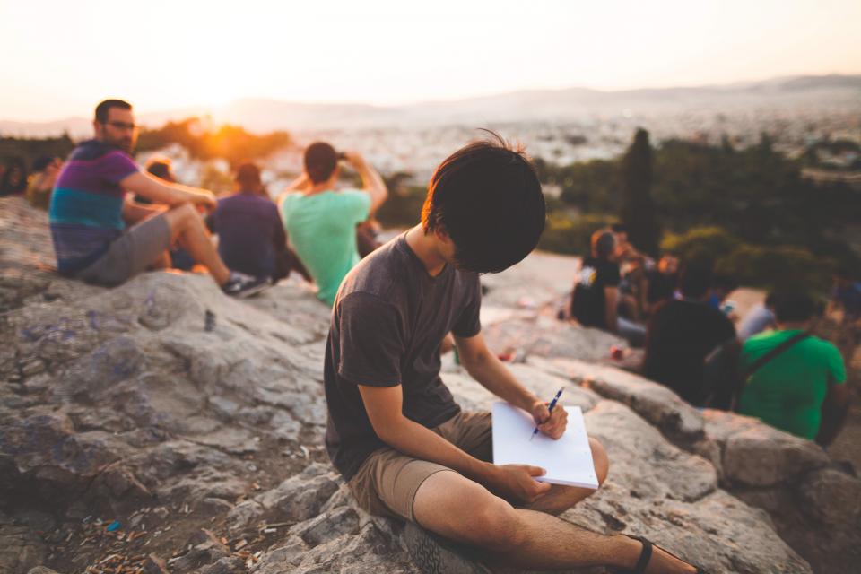 group, friends, people, writing, pen, pencil, paper, notepad, notebook, sunset, rocks, outdoors, nature, adventure