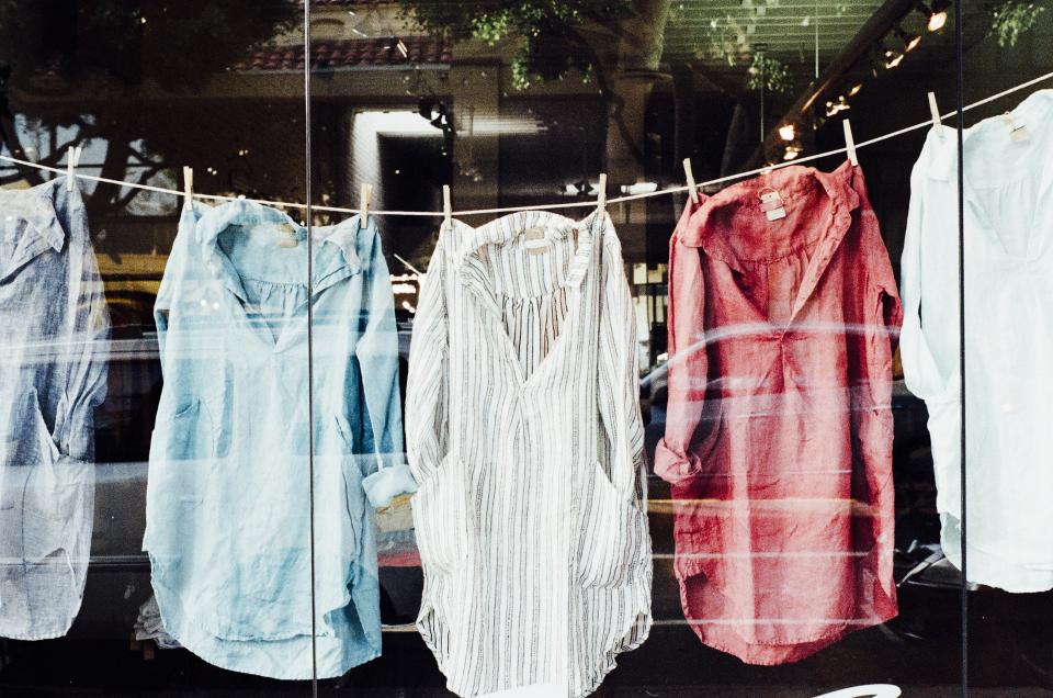 clothes shirts hanging drying laundry clothes line window