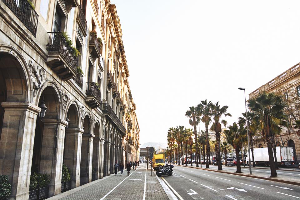 architecture building infrastructure structure establishment road highway vehicle transportation trees lamp post