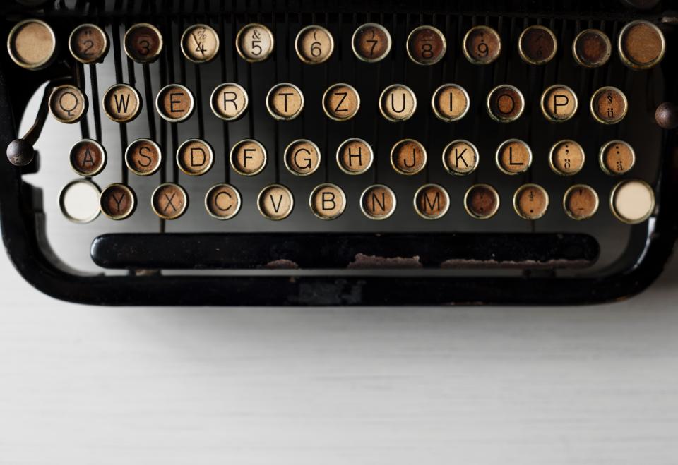 typewriter electromechanical machine work desk office