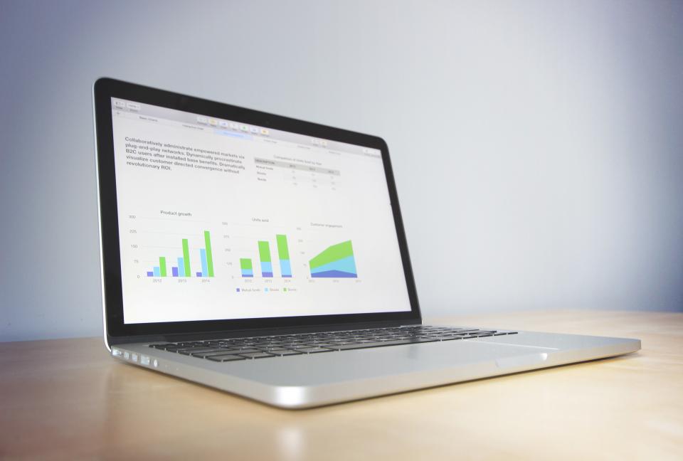 macbook laptop business work computer charts technology graphs presentation