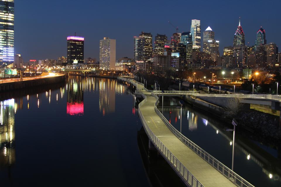 architecture building infrastructure blue sky night lights bridge pathway road water reflection city skyline tower city urban
