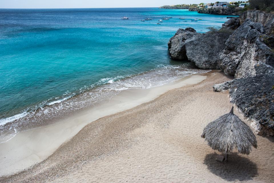 beach, sand, water, ocean, sea, tropical, caribbean, paradise, coast, rocks, umbrella, boats