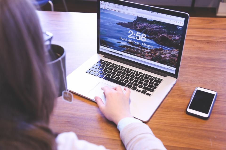 girl woman working macbook laptop computer technology office desk business creative tea cup mug eyeglasses people startup smartphone