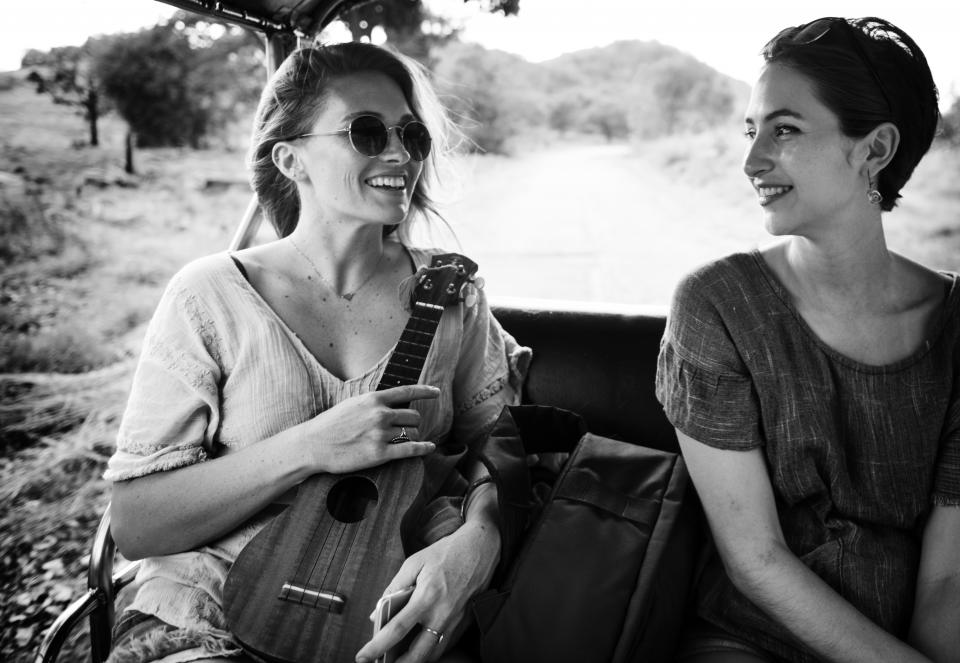 girls women people friends smile smiling happy music instrument sunglasses outdoors black and white