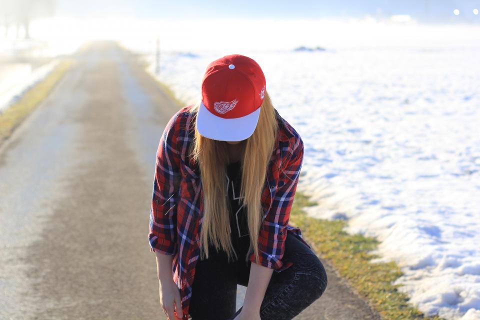 people, girl, woman, lady, walking, alone, street, road, grass, snow, winter, travel, outdoor, red, cap