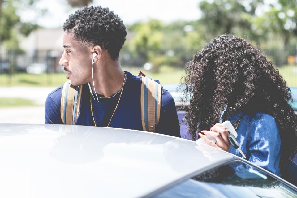 man, woman, girl, guy, curly, car, vehicle, bokeh, trees, couple, key, earphone, backpack, street, necklace, windshield