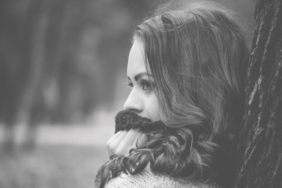 girl alone thinking black and white woman hair
