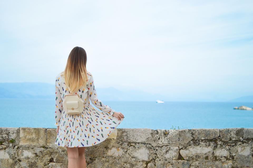 people woman girl dress clothing outdoor nature travel sky blur woman female fashion beauty back bag
