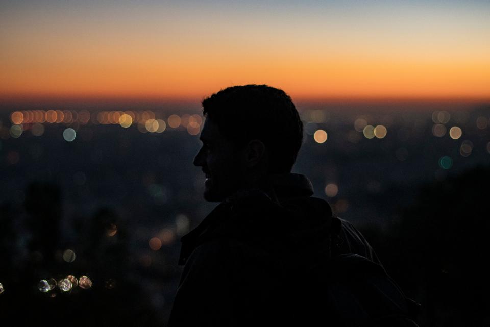people man silhouette sunset bokeh light dark night