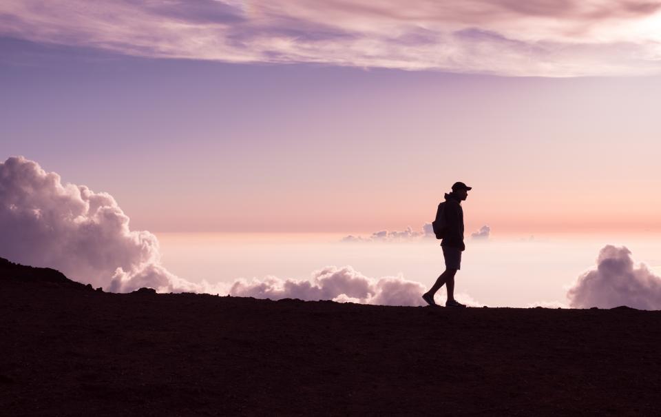 mountain highland clouds sky landscape nature valley silhouette people man walking travel outdoor alone