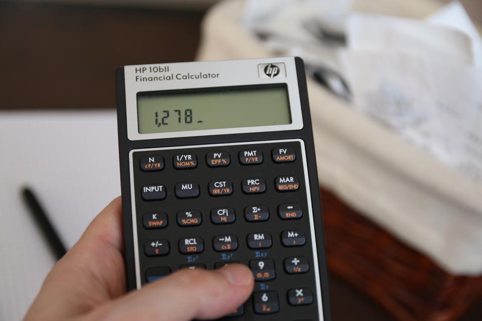 calculator math finance school education work business numbers hands accounting