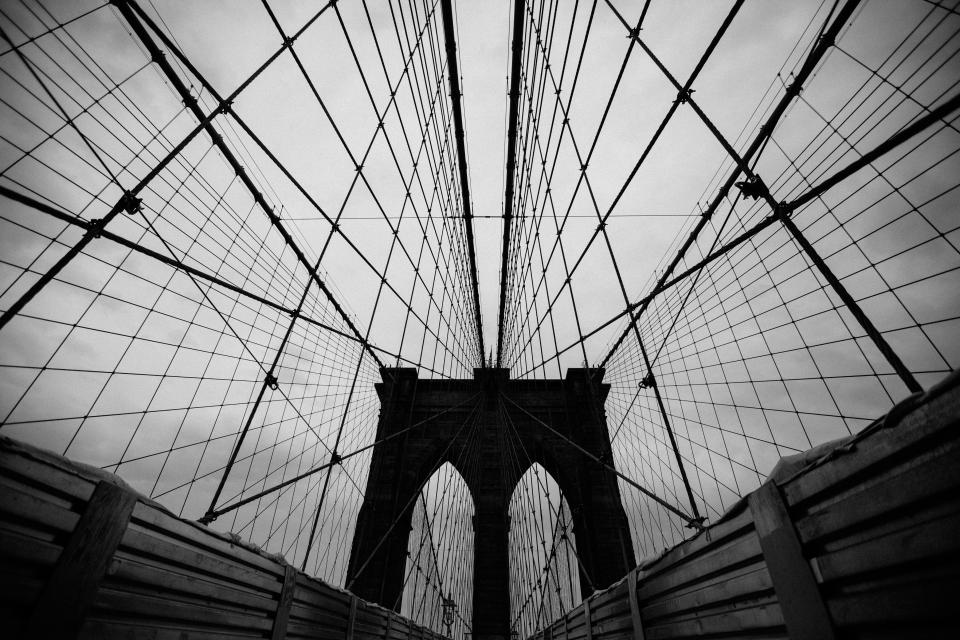 architecture bridges suspension steel iron lines linear patterns perspective black and white industrial