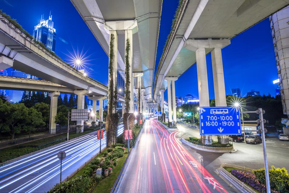 architecture buildings infrastructure blue sky lights street bridge sign tower city urban
