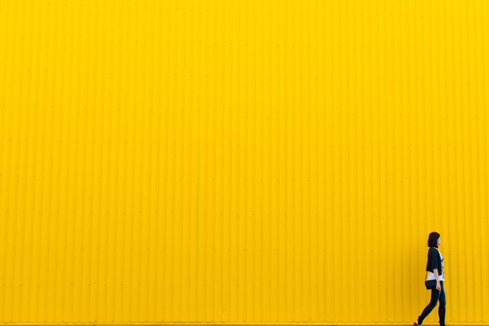 yellow wall building architecture girl woman people